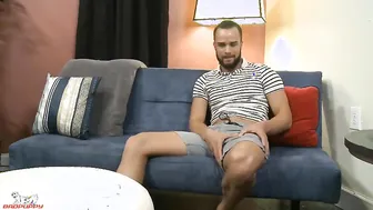 Javier pulls out his uncut cock, lubes it up & starts jacking