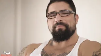 cock is rock-hard as he stretches his balls