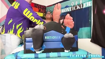 Bound fat guy endures tickling torment