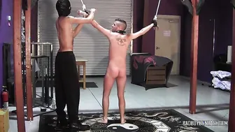 Bound Luca Coriu endures rough spanking from Calvin Collins