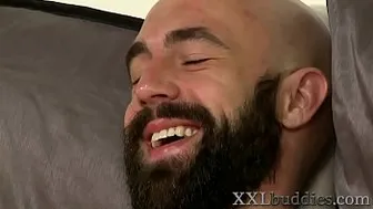 Bearded bald hunk with big dick gets sucked